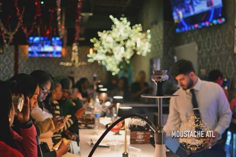 Interior of Moustache Hookah Lounge showing elegant ambiance and decor